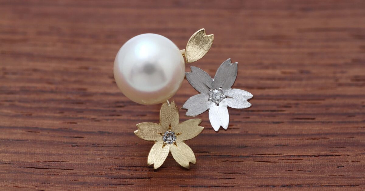 桜のモチーフの真珠のピンブローチK18,Pt900製の画像